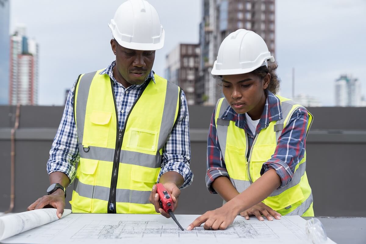 Workers looking at a document